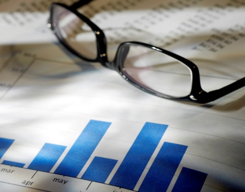 Glasses lying on paperwork