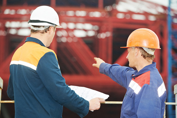 Foreman instructing at a construction site