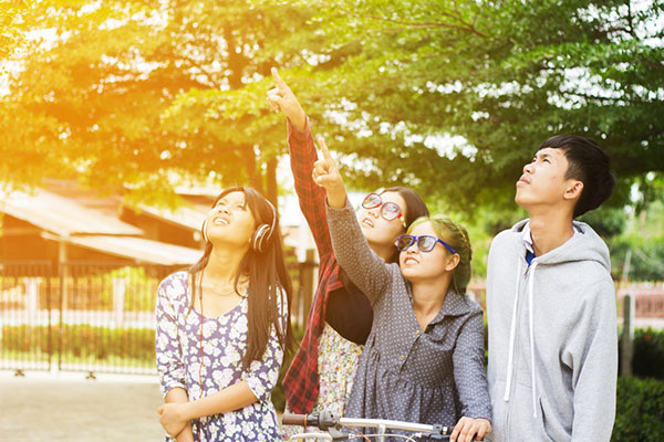 Teenagers looking up