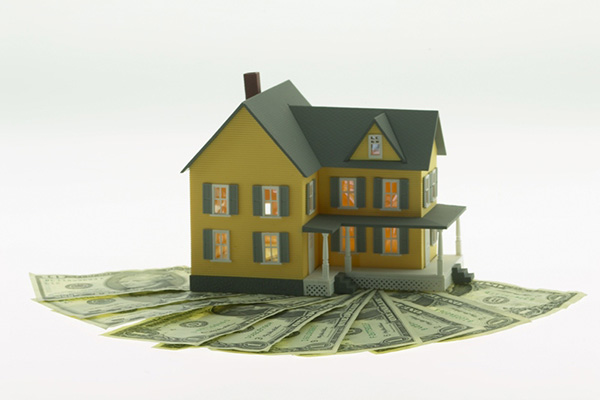 House on top of fanned money