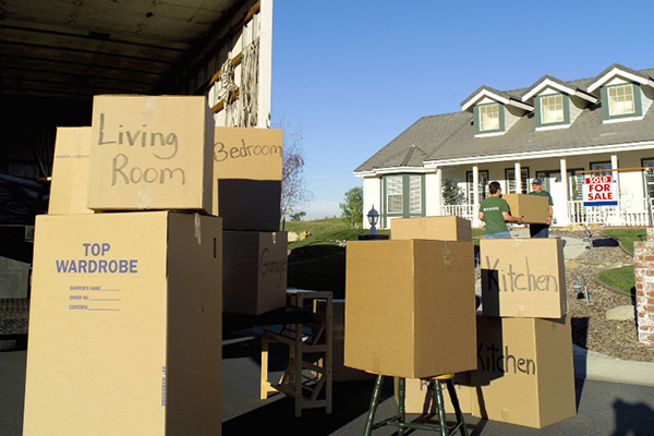 Moving truck and piles of boxes
