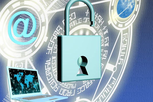 A laptop, open lock, and @ symbol on the screen