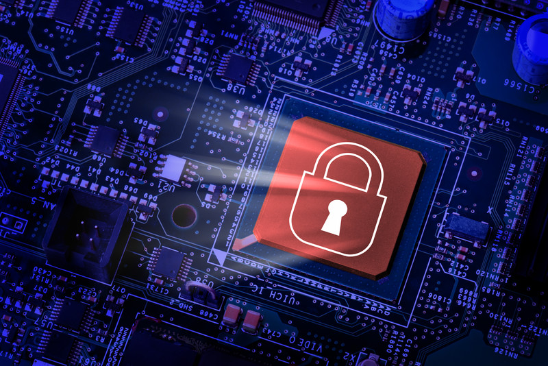 Red security lock symbol on a blue computer chip