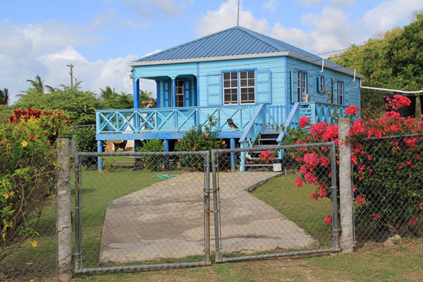 House with padlocked fence