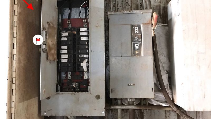 Faulty electrical wiring in a breaker box 