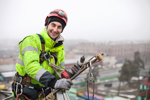 Construction worker wearing a harness