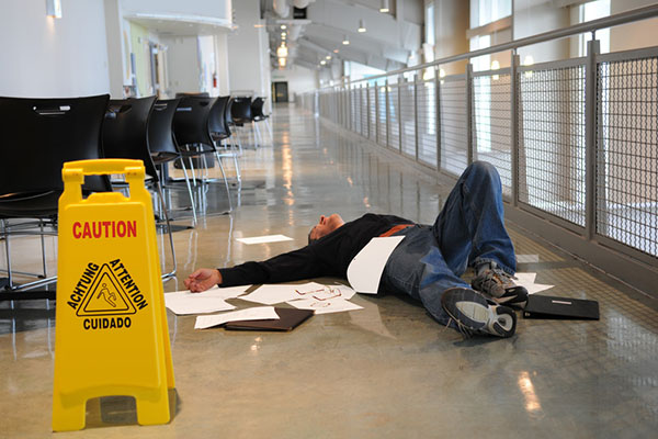 Man fallen on wet floor