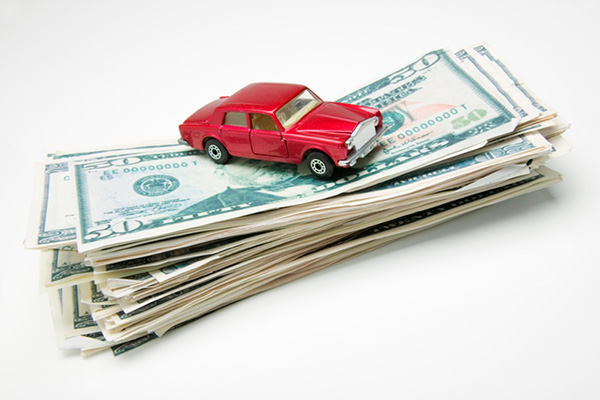 Car on a stack of money