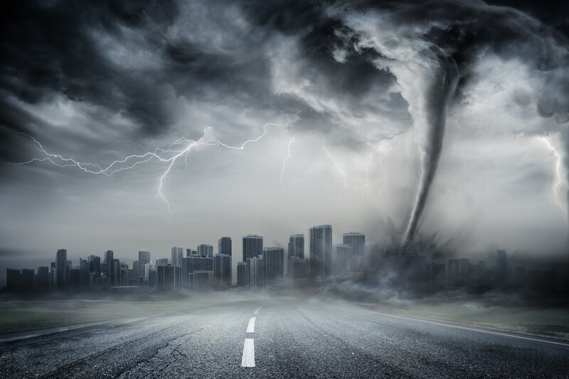 Large city in the background with a tornado