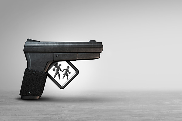 Hand gun with students in trigger