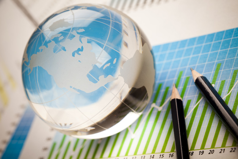 Globe and money graph