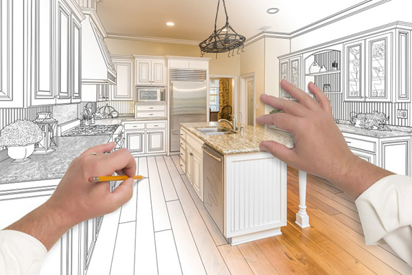 A hand sketching a luxury home renovation