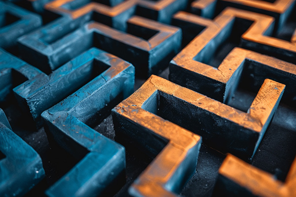 A three-dimensional maze in shades or blue and orange