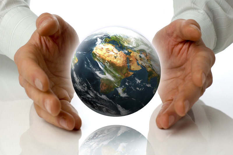 Businessman holding Earth