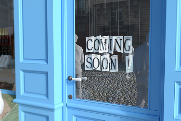 "Coming Soon!" sign in store window