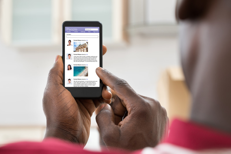 Person using social media on smartphone