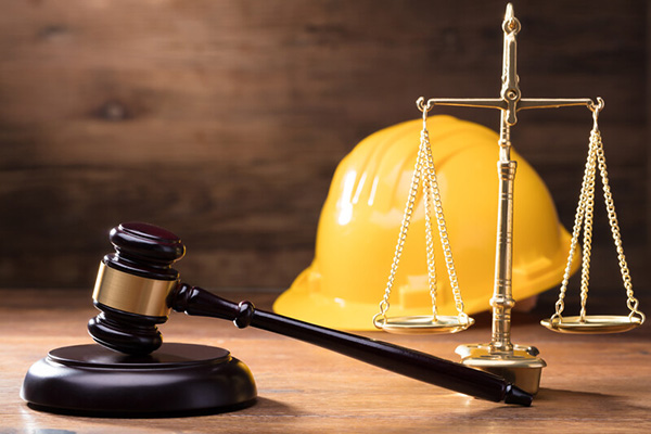 Construction hat and gavel