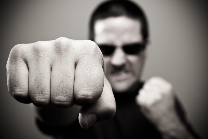 Bouncer throwing punch
