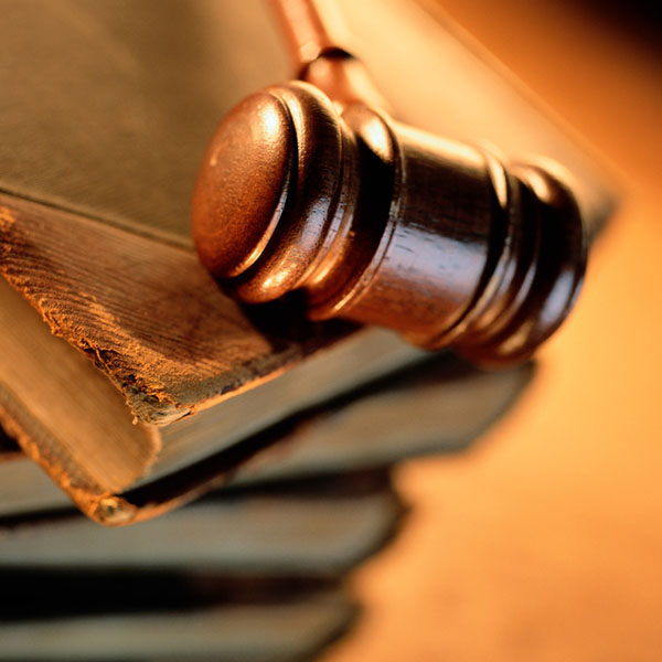 Gavel on stack of books