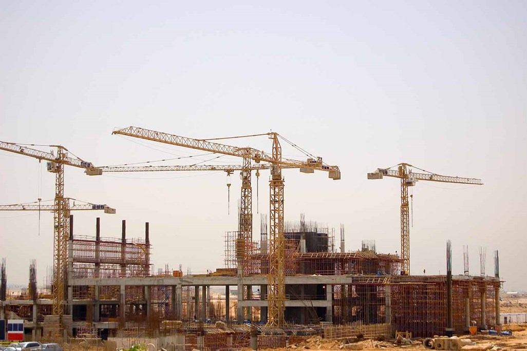 Multiple cranes at a construction site