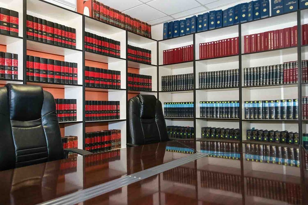 Interior of Lawyer's Office with Wooden Table and Full Book Shelves