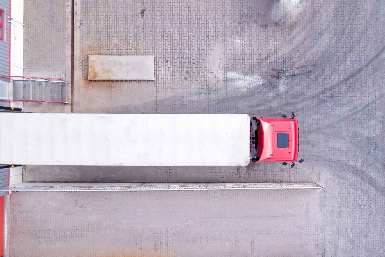 White Single Semi Truck Loading at Warehouse