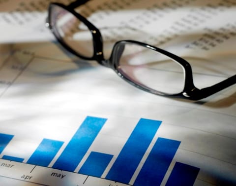 Glasses lying on paperwork
