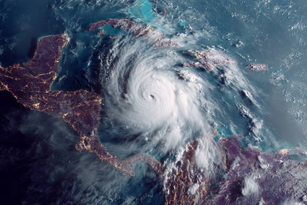overhead view of a weather map showing Hurricane Melissa moving over the Caribbean and Jamaica