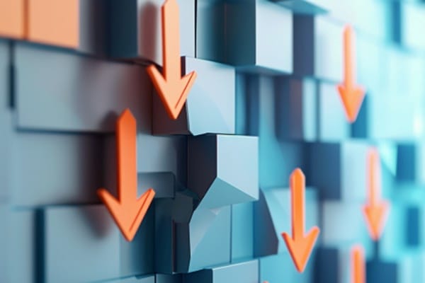 An abstract view of blue blocks with orange downward arrows sitting on top