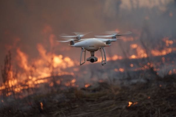drone flying over a wildfire