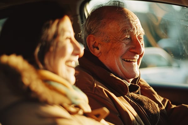 Senior citizen driving a car