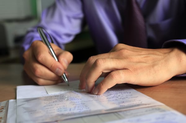 Businessman editing a contract